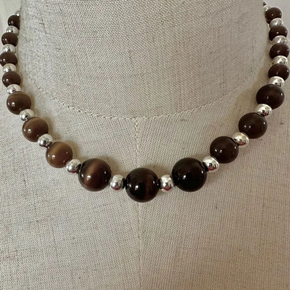 Silver tone and brown beaded necklace